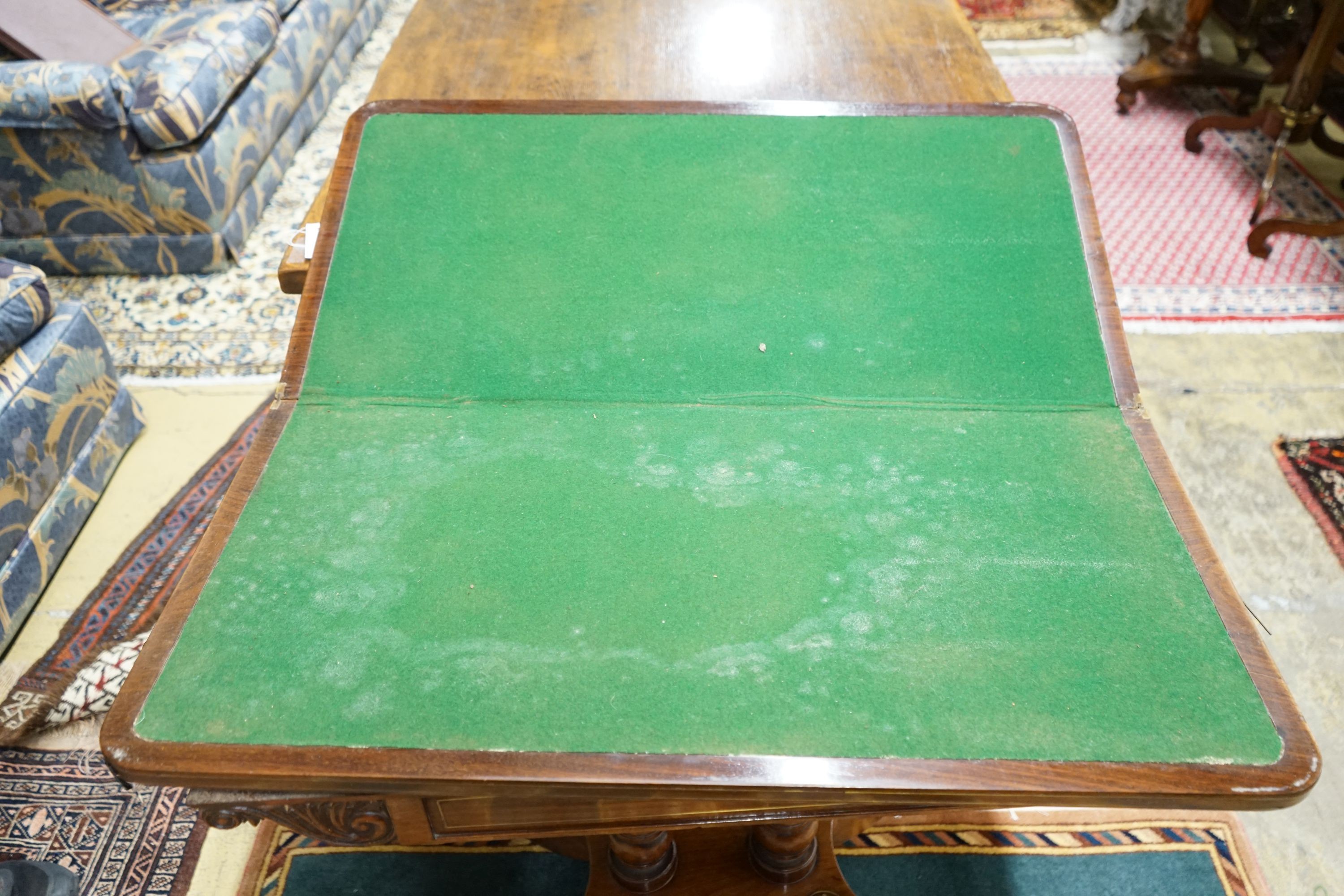 A Regency brass inlaid mahogany rectangular folding card table, width 86cm, depth 43cm, height 74cm